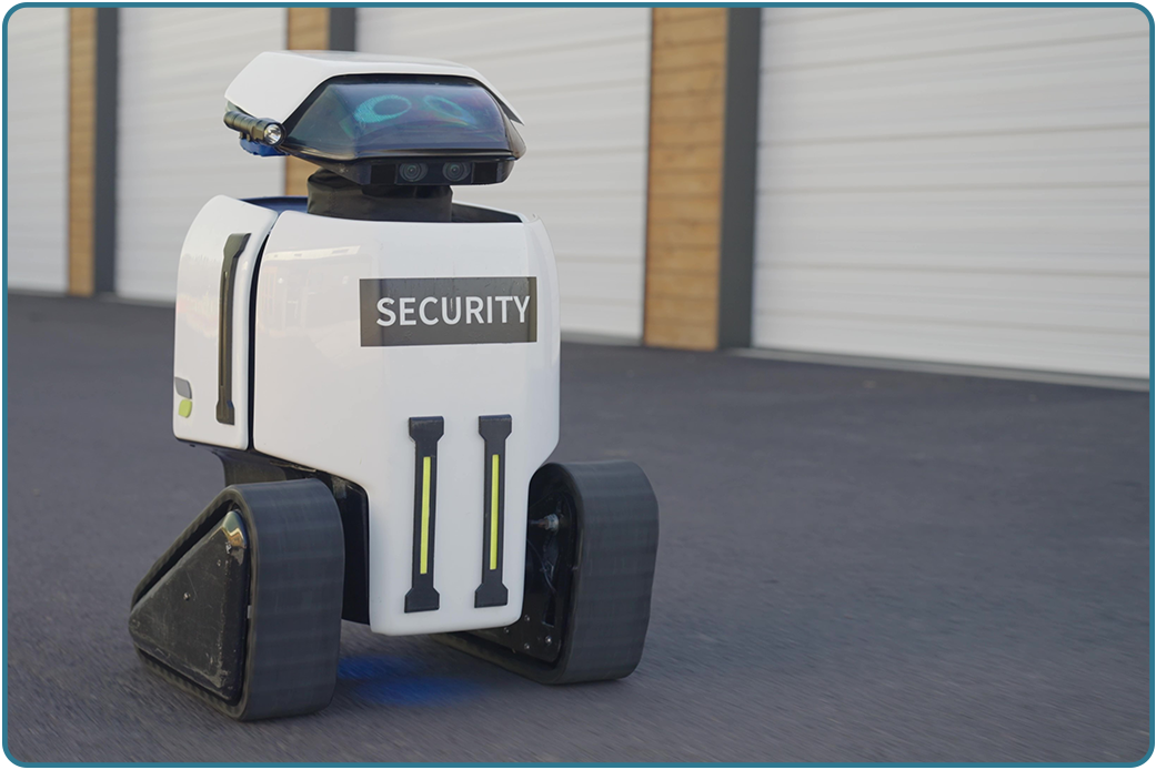 A Dax security robot on patrol in front of a row of storage units
